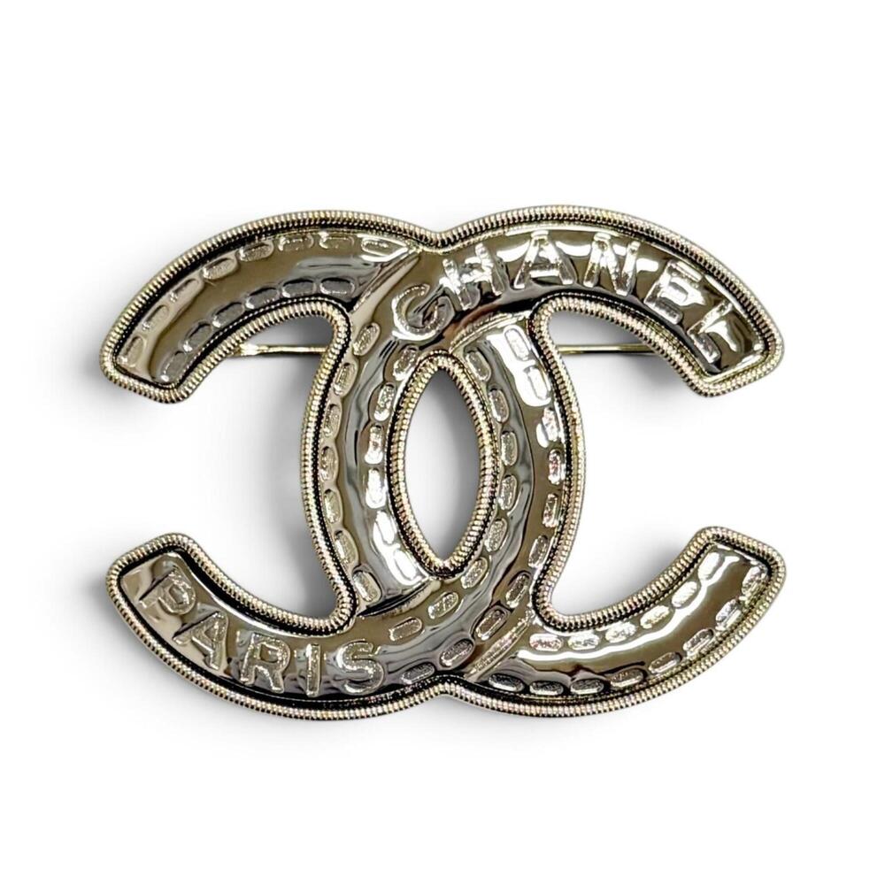 CHANEL Silver Logo Brooch